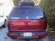 Performance Accessories sells a body kit that doesn't allow the hitch to fit while the bumper is lifted.  I will fabricate the hitch soon to make it fit.  I also installed another whip on the left bumper.