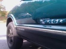 Painted bottom black w/multi-flake, original color was green, also painted rims black.