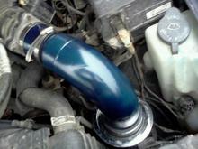 Intake by option racing, cheap, no difference in anything, colored it indigo metallic today, 4/21 to match the truck
