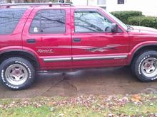 well here is what she looks like, but with out the center caps. still need those desperately!!