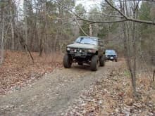 Off roading my blazer is in back and in front an old runner with 35s.