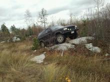 proped up on a rock