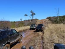 getting lined up to try and make it up the 100 foot washed out hill