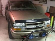 IMAG0316 update took roof tack off (temp) to do some modifications
and put new Baja halogen round off road lights also a bug deflector.