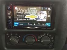 Double din Pioneer AVH-X2700BS DVD with Bluetooth and mirrorlink. Backup camera is also installed and wired into the radio.

Also have the 03-up dash bezel to get the double din opening and hand made steel mounting brackets and hand made rubber radio support bracket. Sorry no pics of the custom mounting hardware.