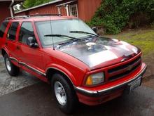 Minor side damage from a parking lot accident.