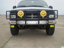 Front of the Truck, Have to Purchase a New Chevy Logo for the Grill. I Have Hella Free Form Housings with 5K HIDs and Custom Fog Lights with 3K HIDs. I Have the Grille Bar With The 3K 100Watt KC Long-Range Daylighters.