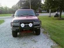 Ripped off the valance.  Polished up the chrome bumper.  Smoked out the fogs and turn signals.  Painted the skid plate. Brush Guard with Dual 6 inch Hellas.  Next upgrades will be custom flares, safari rack, diamond plate skid plates, Realtree AP vinyl wrap.