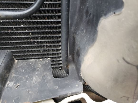Rubbing at the PS cooler hose.