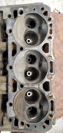 My brother took the heads to his work to grind the valves and clean them all up