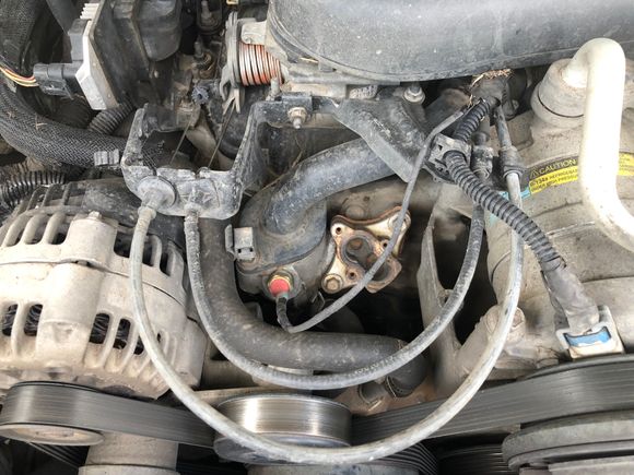 This is my coolant temperature switch that triggers a relay to turn on the fan when it reaches operating temperature. 