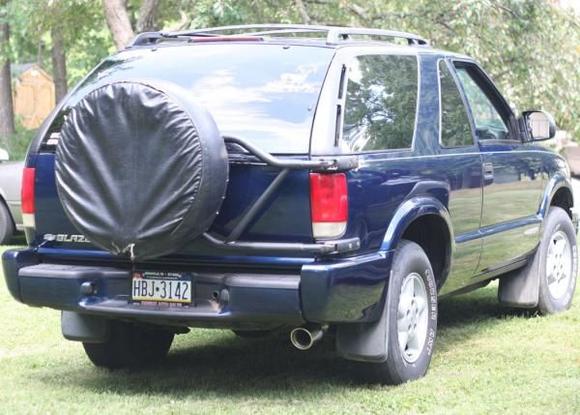 all shined up and lookin pretty. LOOKING FOR NEW SPARE TIRE COVER.