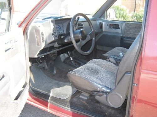 SEPTEMBER 2010 - GREY INTERIOR AND FABRIC UPHOLSTRY. IT'S GOT SOME WEAR AND TEAR, A FEW RATTLES AND CAN RIDE A BIT ROUGH, BUT TO BE EXPECTED FOR A VEHICLE THIS OLD BUT HEY, IT'S A TRUCK
