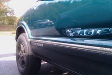 Painted bottom black w/multi-flake, original color was green, also painted rims black.
