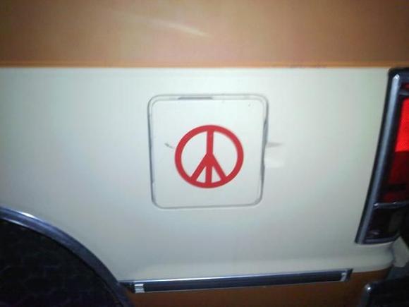 i out a peace sign sticker over my gas cap cover