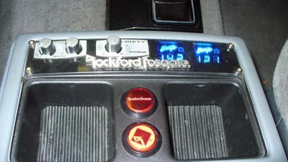 Customized console with volume up and down, sub volume, boost gain and frequency, and individual battery levels.