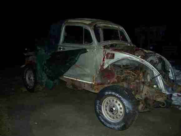 1970 VW bug body on a 1991 S-10 Blazer frame with Trailmaster lift.
