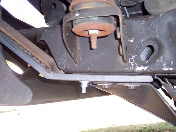 mounted on the frame rails using existing tow hook mounting holes and one extra drilled hole.  mounting bracket is 3/4 in steel with 3/4 in spine welded length of the middle