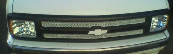 Front view of black and white grille. Ill paint the bumper soon.