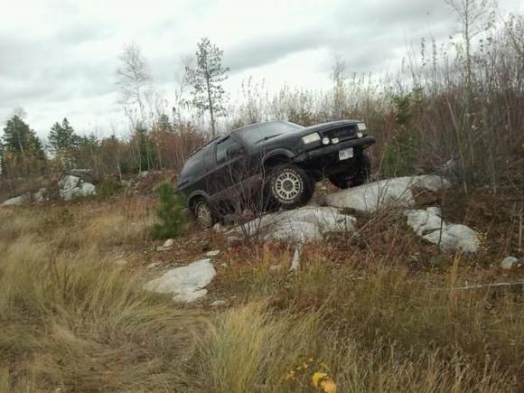 proped up on a rock