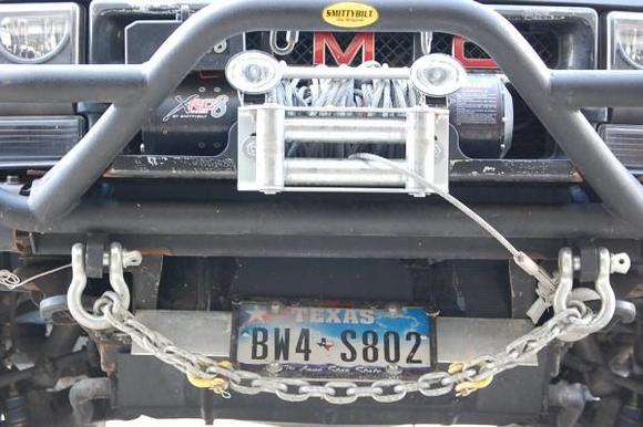 Experimenting with custom air damn to get more air to the radiator.  Winch mount location is good in that the winch is higher than most other blazers I've seen.  GREAT for keeping winch out of harms way but blocks too much air from radiator and truck runs hot.