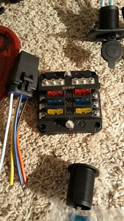 The fuse distribution block thsts going in upper center console, and relay for ignition switched power