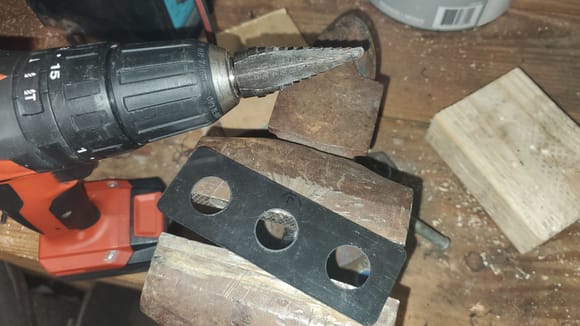 drilled holes to 3/4" with step drill...