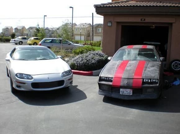 My camaro and my friends Redneck camaro lol