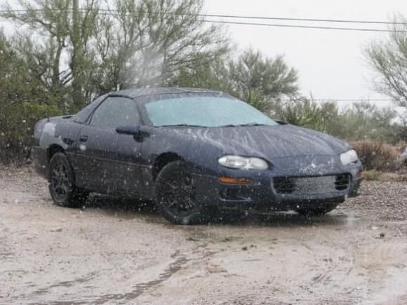I took this picture probably like a year ago.  I just remember that I took it while it was snowing... and that only happens in Tucson once a year haha.  This is also after I painted the rims... obviously:)