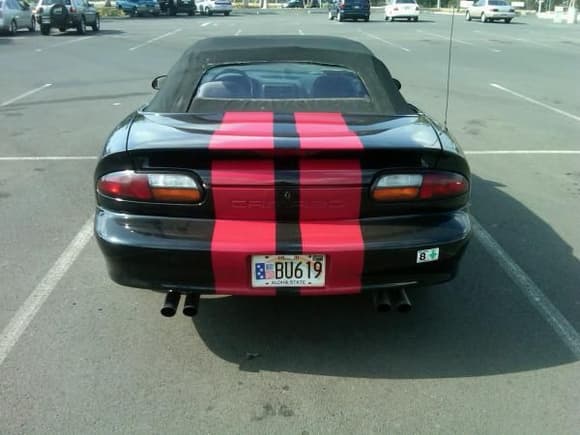 Faux dual exhaust, dont like the tips, so I cut them off so i can get just a straight pipe.  I dont like the four outlets, should be two.  Would like to get the Z28 box outlets but hard to find around here in hawaii