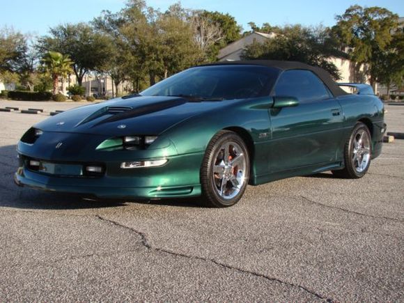 My 95 Z28 convert. six speed. Mods include: Delteq coil pack, BMR strut tower brace, Lower control arms, chrome moly panhard bar, lowering springs, energy suspension motor mounts, trans mount, torque arm mount, ported/polished stock MAF, SS hoold/SLP ram air box, BBK headers/magnaflow HF cat/flowmaster muffer, custom interior, custom stereo/250 amp alternator, custom paint, corvette 17X9.5 rims.