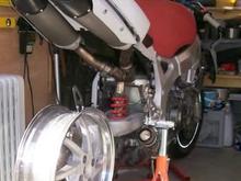 Single sided swing arm conversion