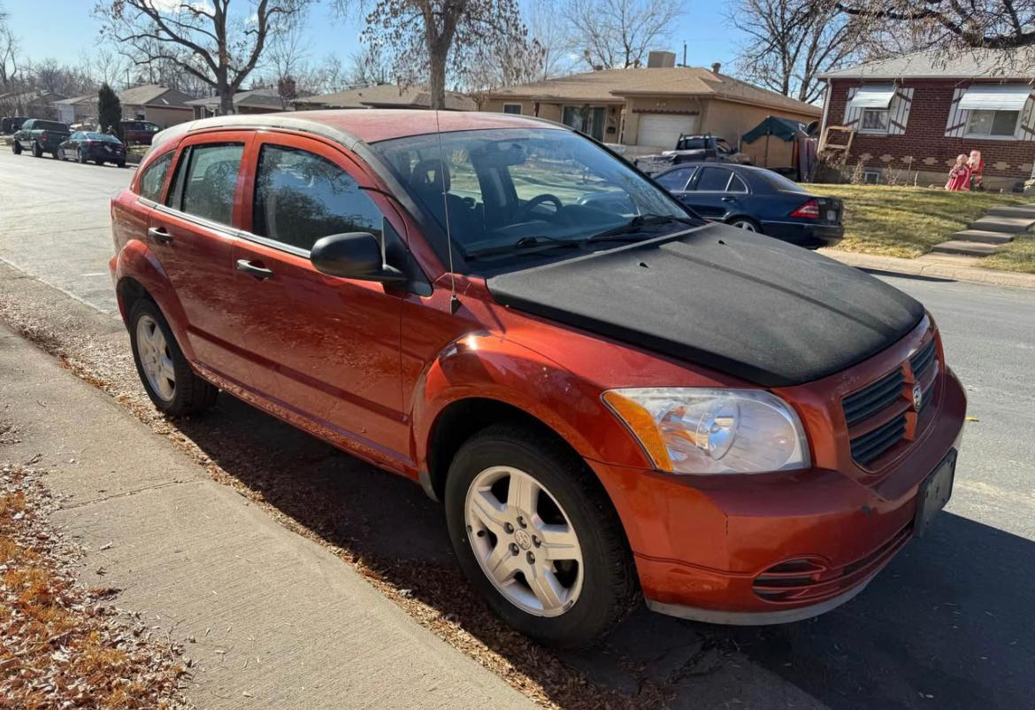 2008 Chevrolet Captiva Sport - 2008 Dodge Caliber · SE Sport Wagon 4D - Used - VIN 1B3HB28C58D747199 - 4 cyl - Manual - Red - Englewood, CO 80113, United States