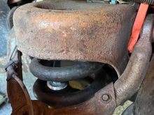 Passenger side - Been hearing a rattle. The  shocks are a month old and the previous on on this side was missing half the bushings 