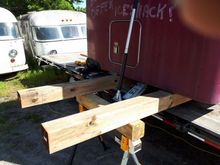 Jacking up one side of the sleeper box, so I can get the sawhorse under the two 6X6. 