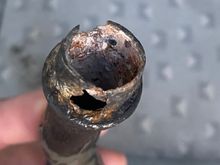 The corroded tip I discovered after pulling it out. 