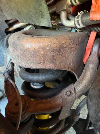 Passenger side - Been hearing a rattle. The  shocks are a month old and the previous on on this side was missing half the bushings 