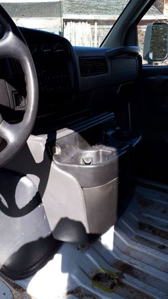 Finally found a center console.  It's not the right color, but I'm happy to have one I can use. 