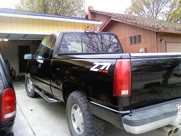The back window is being replaced with a solid window on Monday and then very very dark. The tail lights must go! Hopefully I'll swap them out tomorrow. The blacked out ones.