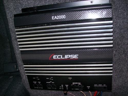 Eclipse EA2000 amplifier, attached to the passenger-rear seat.