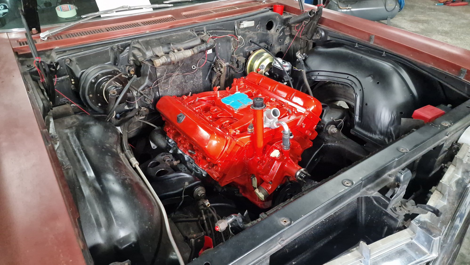 Engine compartment with engine