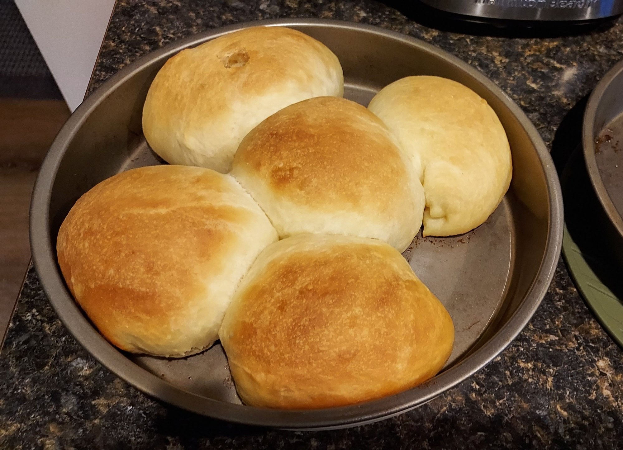 Homemade yeast rolls.  She made 2 pans and one was saved for another meal.  I had 2 rolls with just butter on them with my dinner, and a 3rd with butter and Raspberry jam for dessert.  Man am I stuffed.