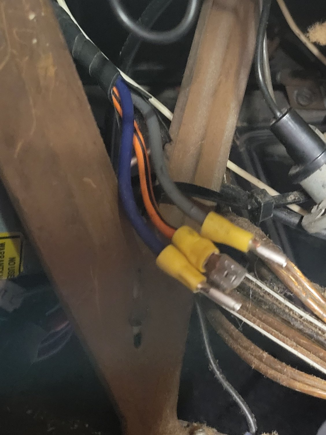 Thank you for uploading the image of your wiring harness. Here is what I have on mine. Appears at some point somebody replaced the end receptacle piece you have with the terminal end clips. I got the new switch in and was able to swap the wires around to get the top working so pressing up is up and down is down. Getting it back in was a slight PIA reaching my right hand back through the glove box insert cavity but all is back together and working well now.