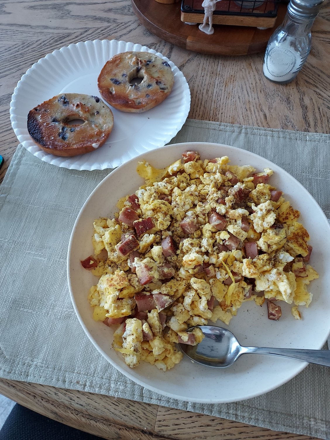 1/2 - Can of SPAM diced and browned, then cooked with 9 eggs scrambled.  Blueberry Bagel smothered in butter.  Ultra-Protein dinner!  👍  You might be amazed at how much more flavorful and tasty it is with SPAM instead of Ham!