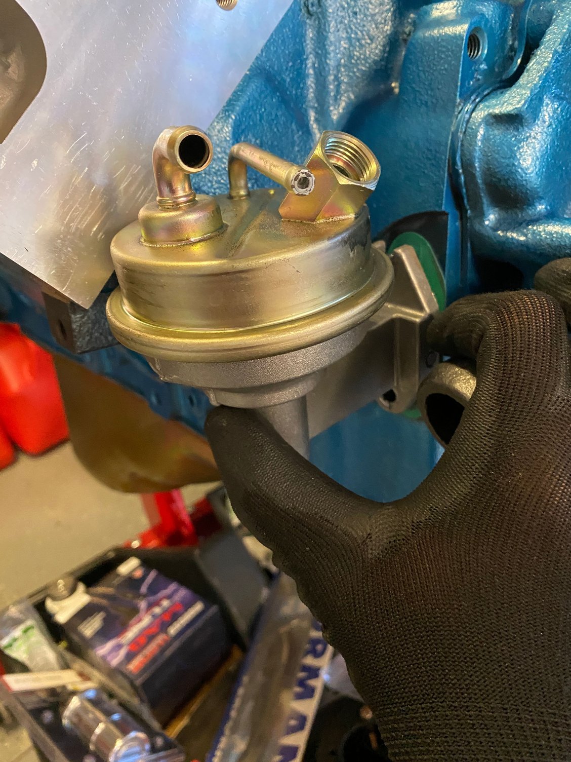 Aluminum heads Mech Fuel pump hitting head