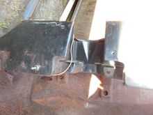 Underside of dash, note the two holes that go all the way through the black painted part. 