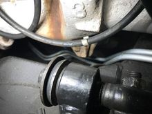 Transmission Cooling Lines - running upwards from around the oil filter and over the crossmember, being careful to keep away from the hot exhaust