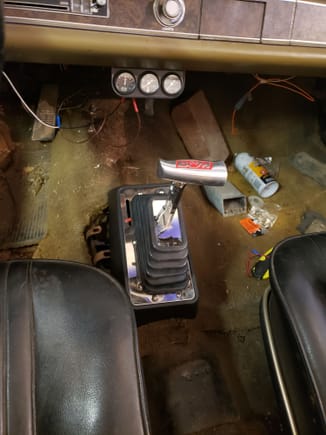 Had to put in a new shifter to go with the auto trans.  The original 4 speed shifter hooked to it was a bit sketchy.  Have to button up the floor, but going to wait and put in new carpet too.