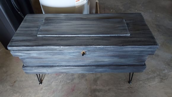 Here is that 1850's era primitive tradesman's (carpenter, blacksmith, etc.) tool chest that she turned into a coffee table with hairpin legs.