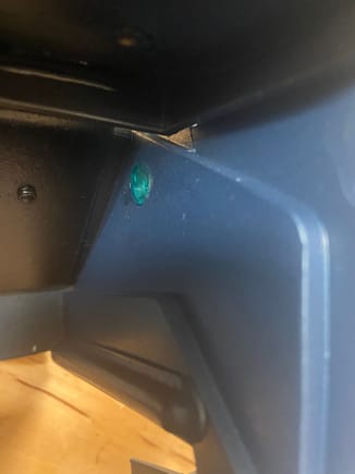 After all these years I did not realize that the Y60 convenience option also included a little light in the ashtray. Tiny blue light lens that the light shines through inside the ashtray area. Build is behind the glovebox liner. 